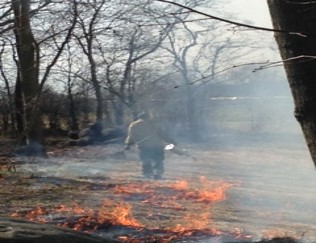 Firefighter Walking Away from a Fire